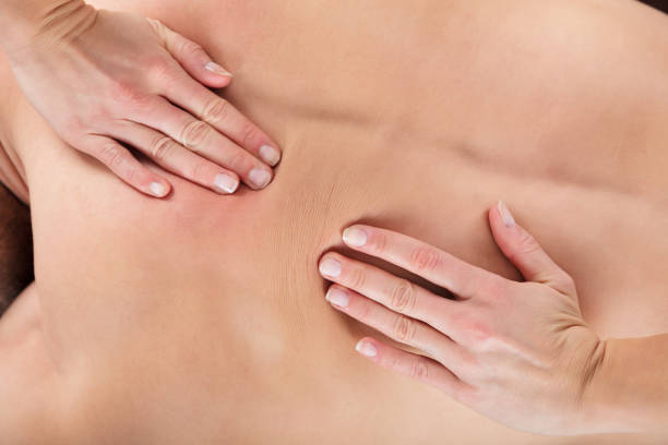 istock Masseur Giving A Relaxing Back Massage 917896026