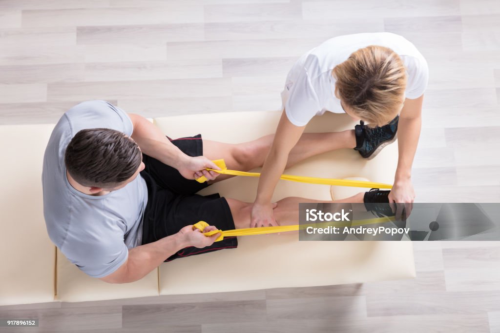 Female Physiotherapist Giving Exercise Treatment Stock Photo - Download Image Now - Physical Therapy, Physical Therapist, Exercising - iStock Female Physiotherapist Giving Exercise Treatment Stock Photo - Download Image Now - Physical Therapy, Physical Therapist, Exercising - iStock