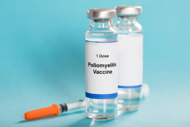 istock Poliomyelitis Vaccine Bottles With Syringe 917896442