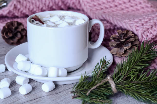 istock Coffee with marshmallows at the Christmas tree. Festive warming 917896806