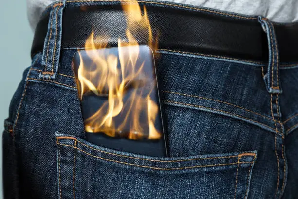 Photo of Burning Phone In Jeans