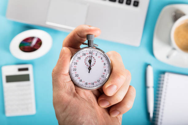 istock Person Stopping A Stopwatch 917901240