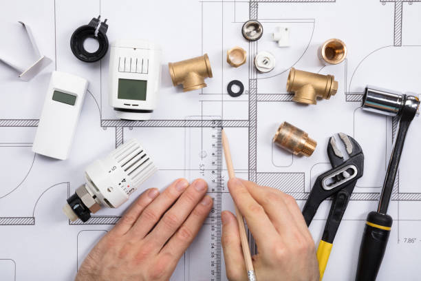 istock An Architect Drawing Plan On Blueprint With Ruler And Pencil 917901562