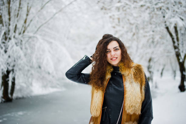 istock Elegance curly girl at winter day 917902046