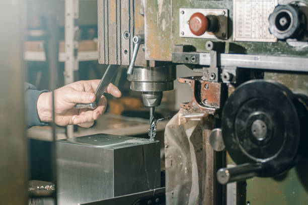 istock Employee drilling. Metal drilling. Metal workshop. 917907268