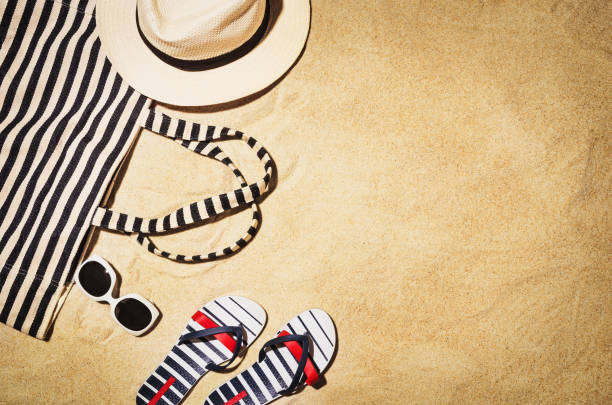 istock Top view towel on sandy beach. Background with copy space 917918312