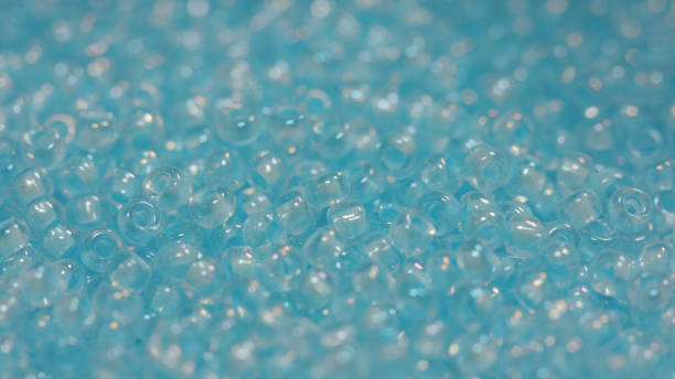istock Pile of small blue beads 917921968