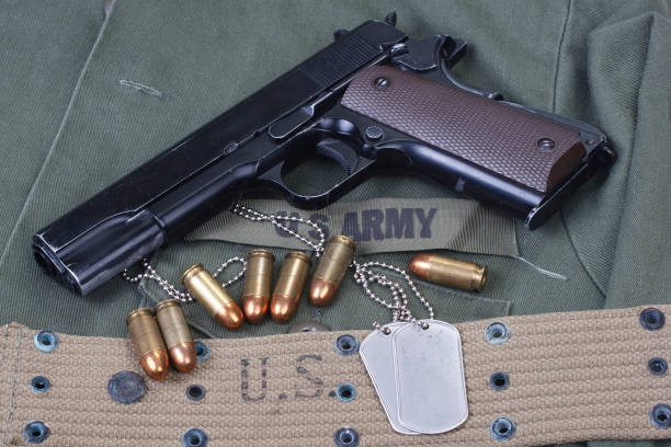 istock M1911 government with US ARMY uniform 917922532