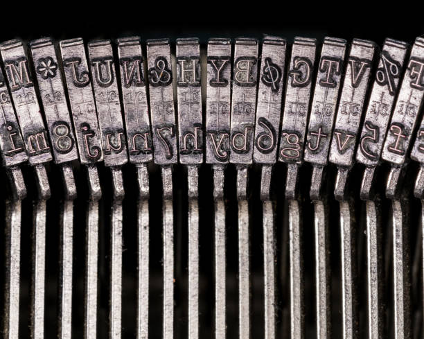 istock Macro detail of typescript inside electric typewriter 917923012