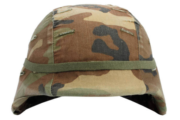 istock us army kevlar helmet with camouflaged cover 917926726