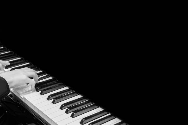 istock Close up musician hand playing piano 917936988