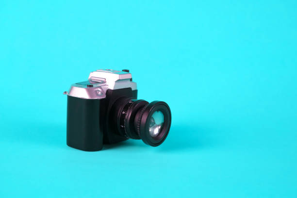 istock Mini camera toy on blue background, copy space for add text. 917937624