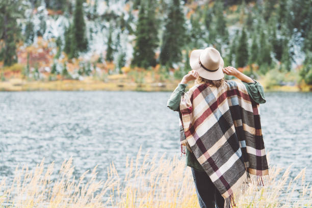 istock Woman traveling among mountains, boho style 917937920