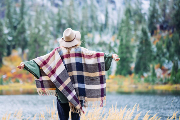 istock Woman traveling among mountains, boho style 917938106