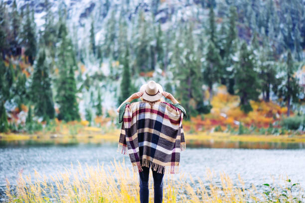 istock Woman traveling among mountains, boho style 917938110