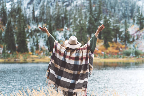 istock Woman traveling among mountains, boho style 917940294