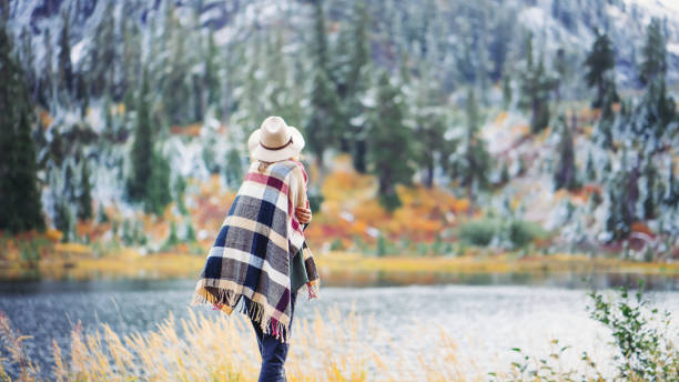 istock Woman traveling among mountains, boho style 917940316