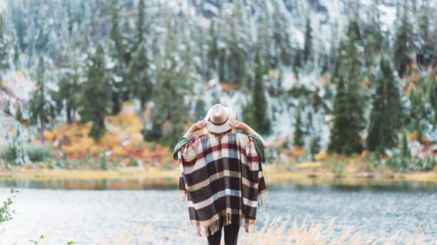 istock Woman traveling among mountains, boho style 917940318