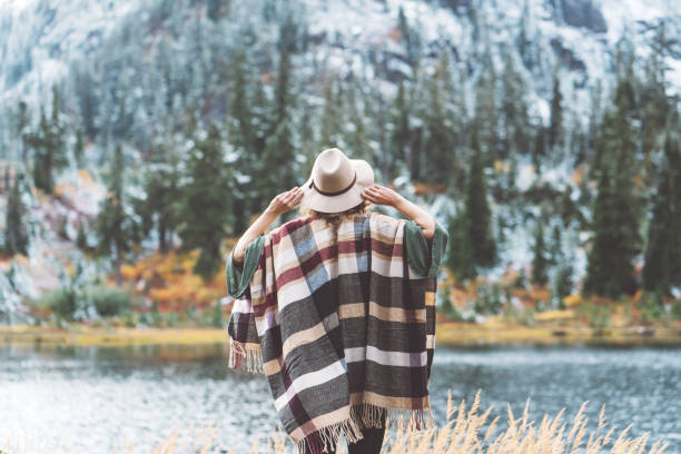 istock Woman traveling among mountains, boho style 917940334