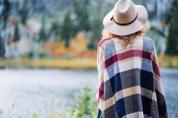 istock Woman traveling among mountains, boho style 917940512