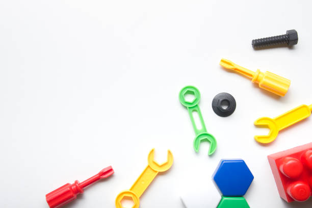 Kids educational developing toys frame on white background. Top view. Flat lay. Copy space for text.