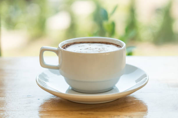 istock hot coffee in white cup on wood in coffee shop 917941012