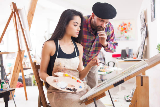 istock Student and teacher working in atelier 917944284
