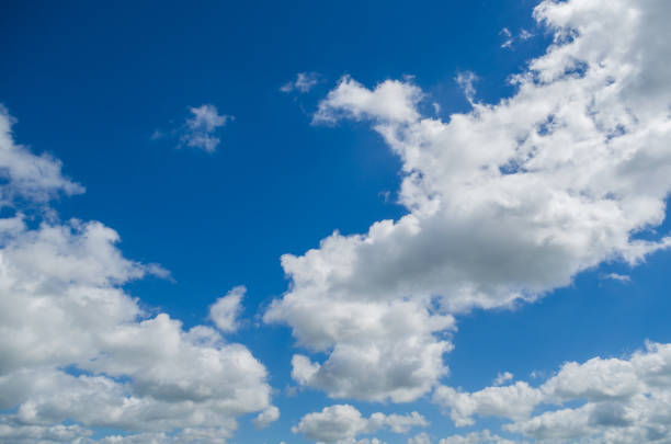 istock Background of blue sky and white clouds 917944800