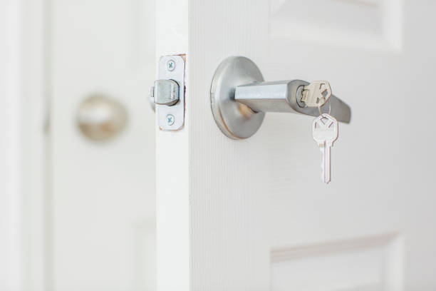 istock door with key in lock 917944924