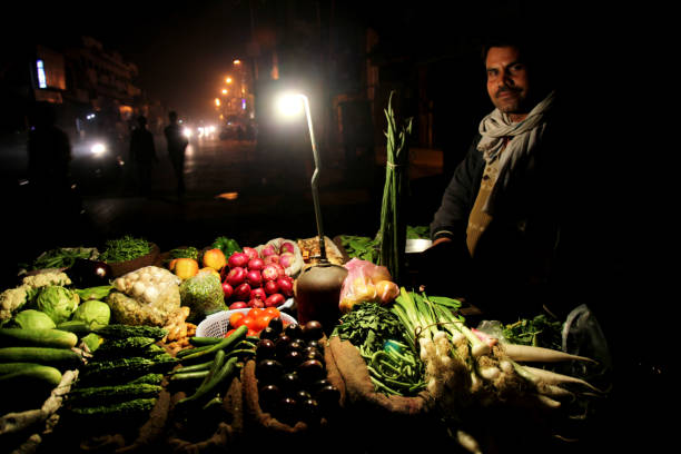Yazd - April 16: Unknown people trades fresh vegetables and fruits in street market in Yazd, Iran on April 16, 2015. Yazd  is the capital of Yazd Province, Iran, and a centre of Zoroastrian culture.