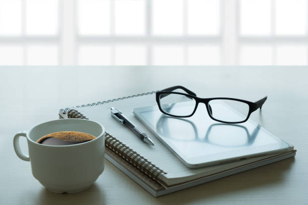 istock Close up of glasses and computer  business workplace work place in office 917964502