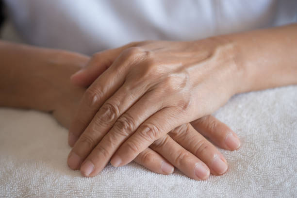 istock Elderly woman suffering from pain From Rheumatoid Arthritis 917964566