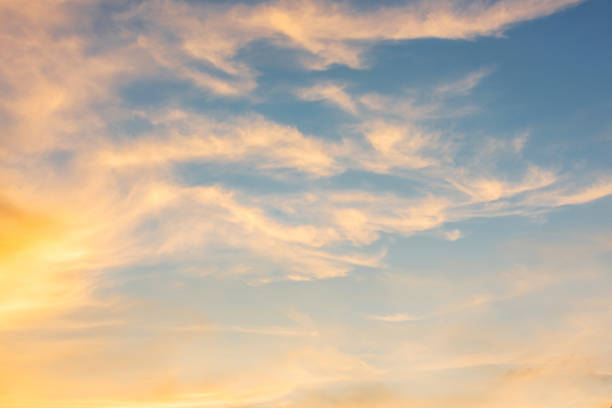 istock orange and blue sky background in the evening or dusk 917975234