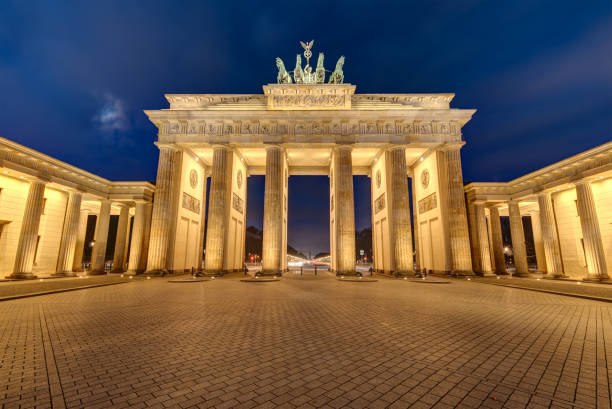 istock The illuminated Brandenburg Gate at night 917980644