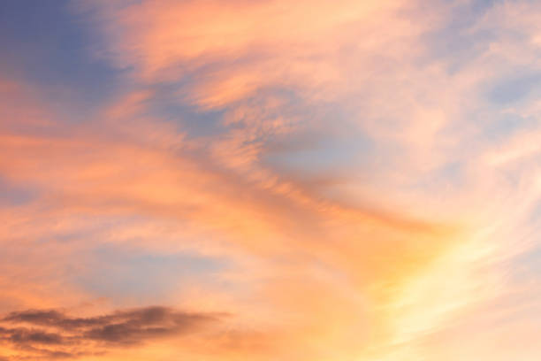 istock orange and blue sky background in the evening or dusk 917980650