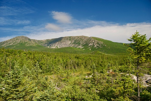 Baxter State Park, ME, USA - August 1, 2011: View of Mount Katahdin on a Beautiful Summer Day with Clouds in Blue Sky