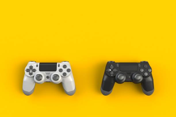 istock Computer game competition. Gaming concept. White and black joystick isolated on yellow background, 3D rendering 917991418