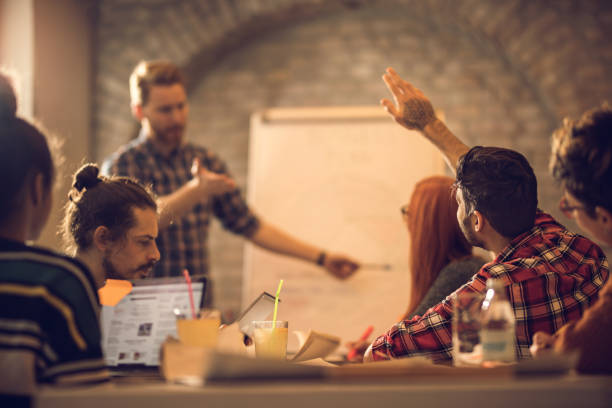 istock Colleague, may I add something to that business idea? 918012350