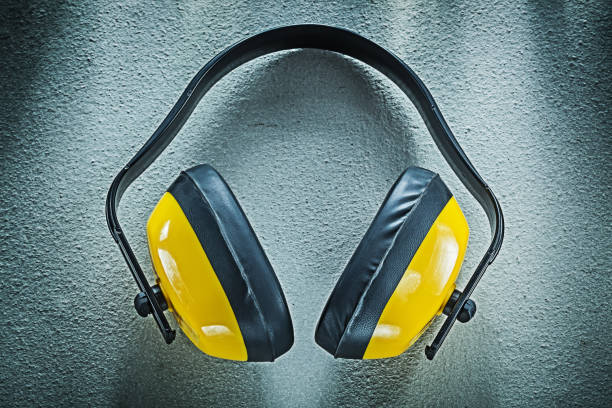 istock Earmuffs on concrete background top view 918020570