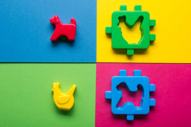 Kids educational developing toys frame on colorful background. Top view. Flat lay. Copy space for text.