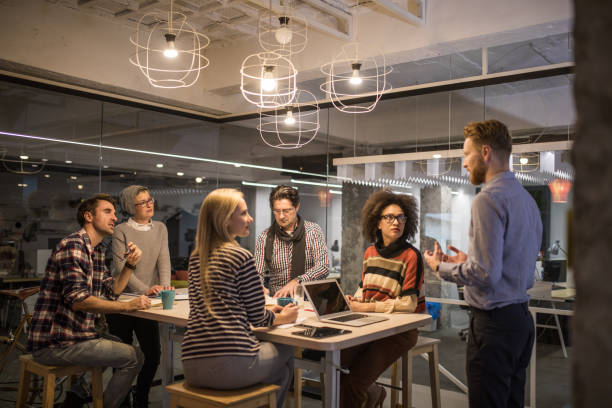 istock Large group of entrepreneurs having a constructive meeting in the office. 918020994