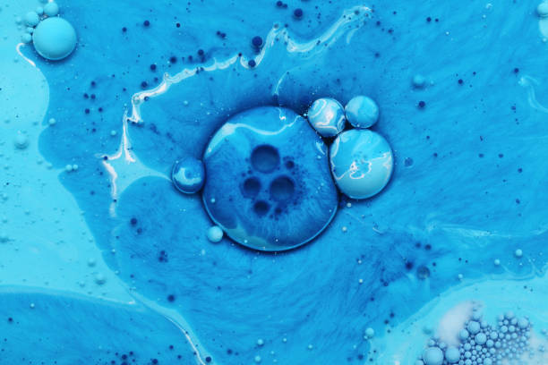 istock Abstract background from blue acrylic paints and oil 918021080