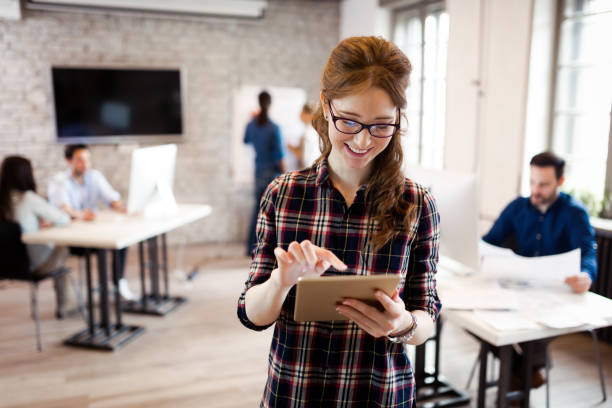 istock Portrait of young beautiful architect in office 918021106