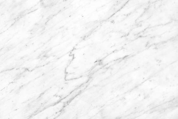 istock White Carrara Marble natural light surface for bathroom or kitchen countertop 918030952