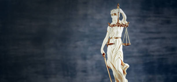 istock Law and Justice concept. Brown wooden background 918032118