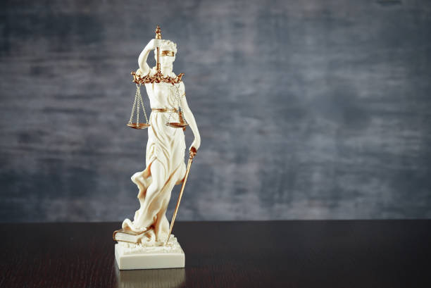istock Law and Justice concept. Brown wooden background 918032124