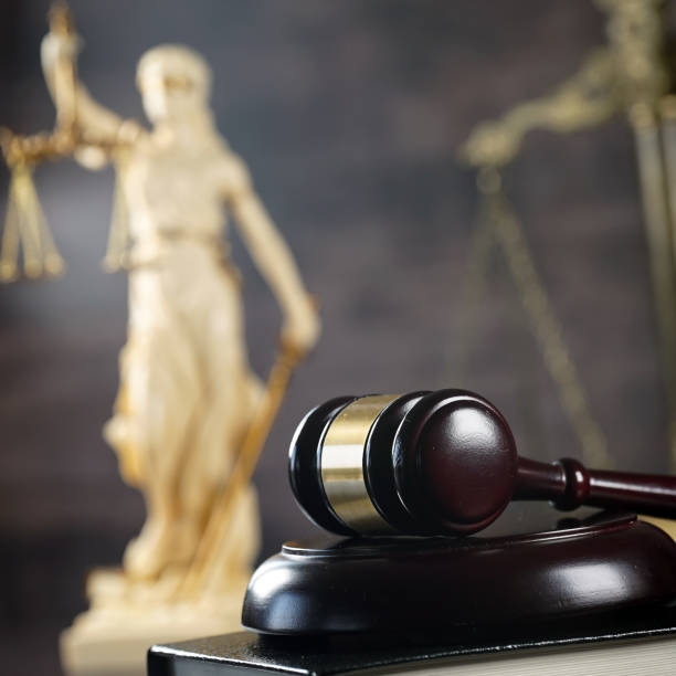 istock Law and Justice concept. Brown wooden background 918032328