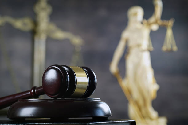 istock Law and Justice concept. Brown wooden background 918032346