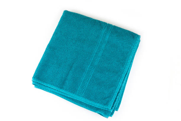 istock Medium towel for the bathroom and bath on the white 918032384