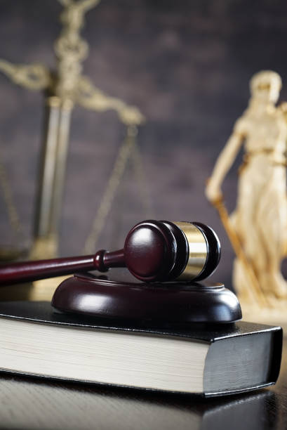 istock Law and Justice concept. Brown wooden background 918032430